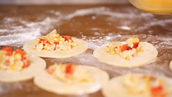 Time lapse. Step by step. Making home made empanadas with different fillings.