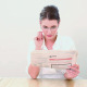 Beautiful Brunette Reading The Newspaper - VideoHive Item for Sale