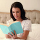Beautiful Brunette Sitting In Bed Reading A Book - VideoHive Item for Sale