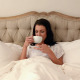 Beautiful Brunette Lying In Bed Drinking Coffee - VideoHive Item for Sale