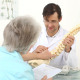 Chiropractor Showing Spine Model To His Patient - VideoHive Item for Sale