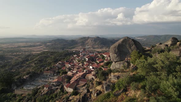 Strategically placed Monsanto village on mountaintop, unique architecture; drone