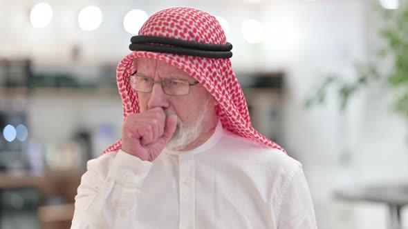 Sick Senior Old Arab Businessman Coughing