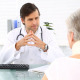   Doctor Talking To Retired Patient In Neck Brace - VideoHive Item for Sale