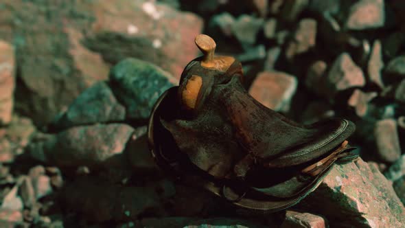 Old Leather Saddle on the Stone Outdoor