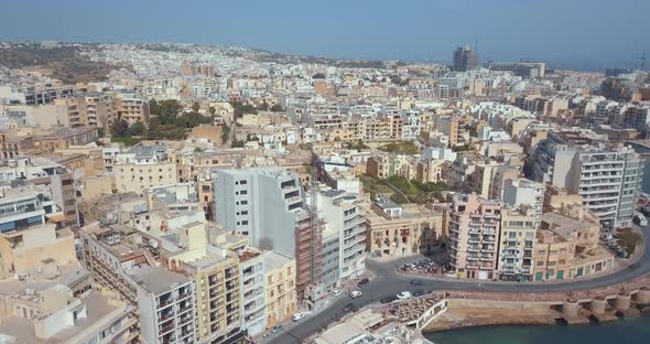 Spinola Bay with Traditional maltese Luzzu