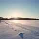 Aerial Drone View of a Fields Covered with Winter Snow during Sunset - VideoHive Item for Sale