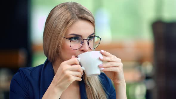 Pensive Beautiful Business Woman Drinking Coffee From Cup Relaxing Enjoying Break Medium Closeup