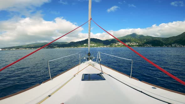 Sailing Boats in Blue Ocean Waters Ina Sunny Day. First-person View From a Boat Sailing Along the