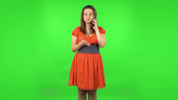 Cute Girl Angrily Speaking on the Phone, Proving Something