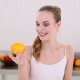 Smiling Model Smelling An Orange - VideoHive Item for Sale