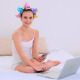 Young Model In Hair Rollers Using Her Laptop - VideoHive Item for Sale
