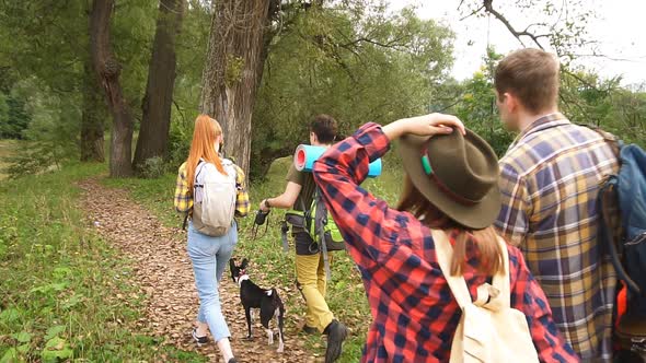 Young Motivated Travellers Exploring Landscape. Slow Motion