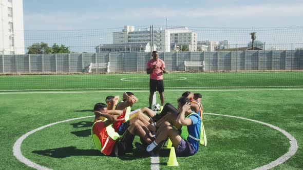 Soccer players training on field