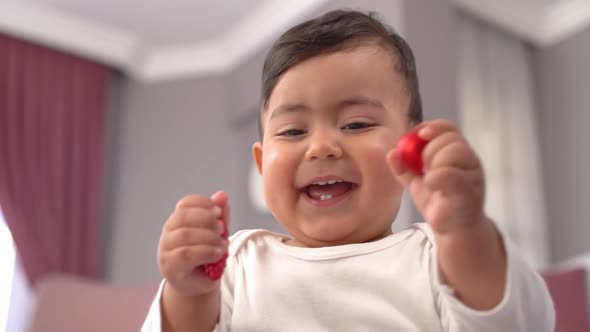 Happy baby playing.