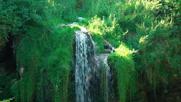 Waterfall In The City Park