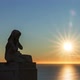 Statue of a Women Praying at Sunrise - VideoHive Item for Sale