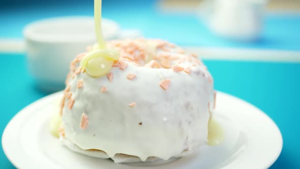 Condensed Milk Flows on Delicious Sweet Donut