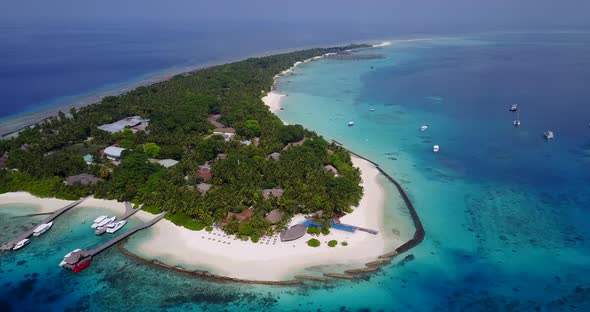 Luxury overhead copy space shot of a white paradise beach and aqua blue ocean background in high res