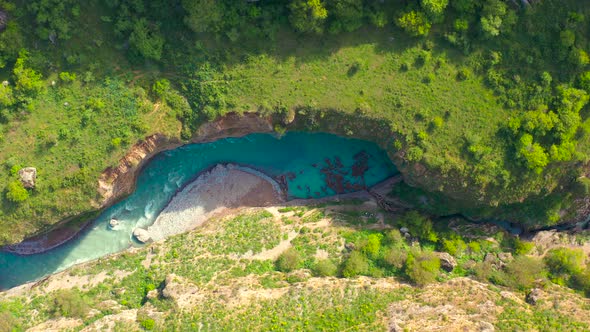 Aerial Top View on Lot of Driftwood in Bluer River on Aksu Canyon in AksuZhabagly Nature Reserve