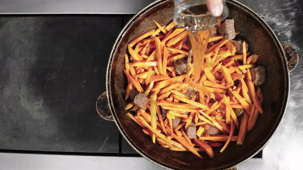 Pouring Water into Dutch Oven