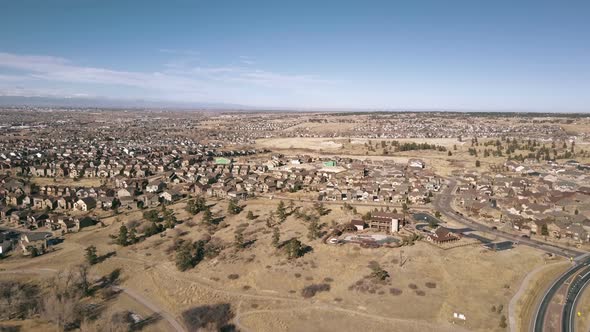 Aerial view of residential neighborhood in suburbia in snowless Winter