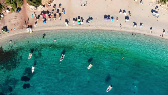 Aero. Top View. Beautiful Summer Seascape. Wild Beach of Evia Island, Greece. Sea Bay with Turquoise