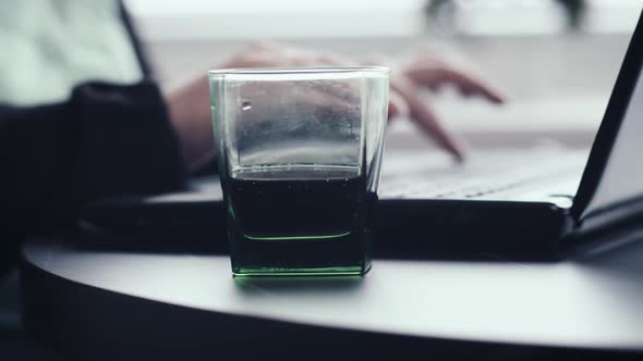 Woman Working on Laptop at Home Close Up Freelance a Glass of Soda Near the Laptop Cinematic Shot