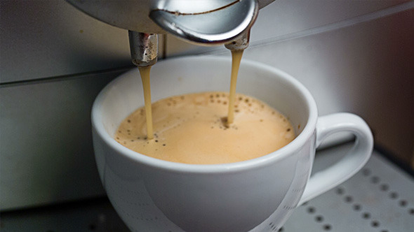 Coffee Machine Making Espresso into a Cap 817