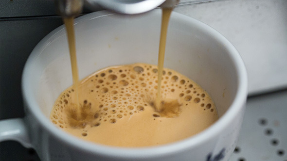 Coffee Machine Making Espresso into a Cap 819