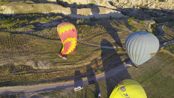 Colorful Hot Air Balloons Flying Over the Valleys