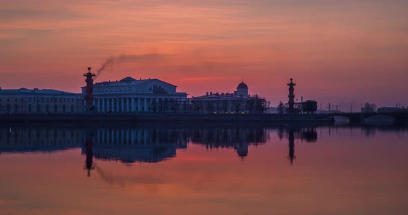 Timelapse of Old Stock Exchange Building and Rostral Columns in Dusk Water Area of Neva River at