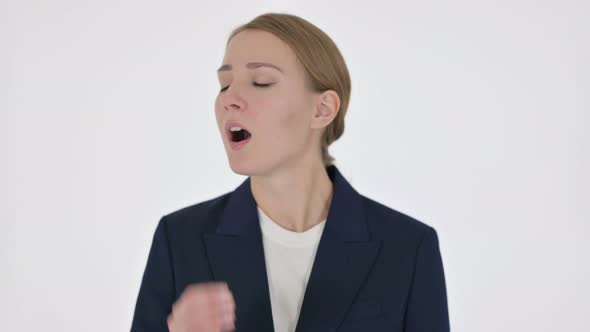 Young Businesswoman Yawning on White Background