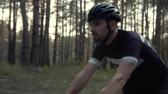 Cyclist Training Leisure Twists Pedals On Triathlon Bicycle. Gear System  And Bike Wheel. Workout.