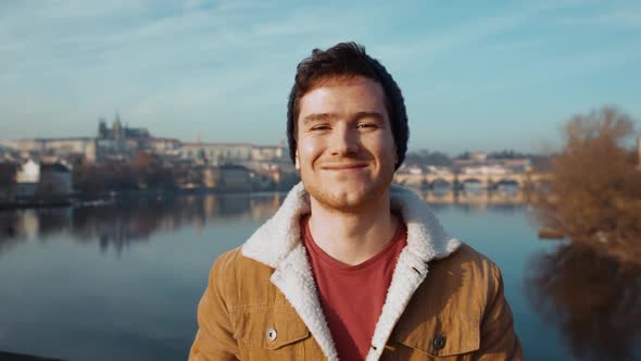 Cool and Moody Portrait of Beautiful Young Man Looking Into Camera in Slow Motion in Euro Town Czech