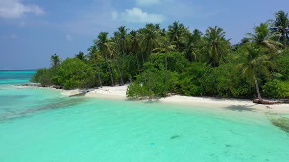 Aerial drone scenery of beautiful resort beach adventure by turquoise sea and white sandy background