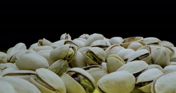 Macro Lens Very Closeup Macro Shot of a Pistachio in Beautiful Light on a Black and Yellow