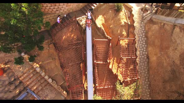 Aerial of kids playing at school playground