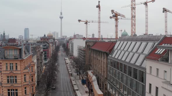 Slow Flight Through Empty Central Berlin Neighbourhood Street with Cathedrals and View on