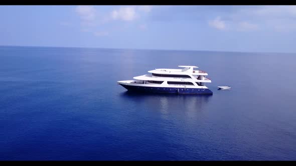 Aerial drone view nature of tranquil lagoon beach wildlife by turquoise sea with white sandy backgro