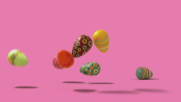 falling easter eggs on a uniform background