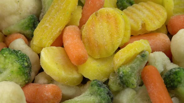 Fresh Frozen Vegetables Rotating for Background Healthy Food or Diet Food for Vegetarians and Vegans