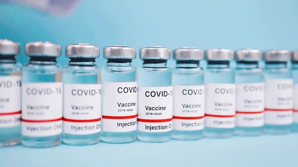 Covid 19 vaccination vial, distribution and manufacture of the coronavirus new cure, vaccine product