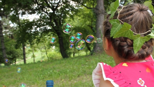 Little Girl Making Bubbles 3