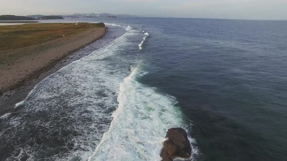 Drone View of the Sea Coast with Rocky Shore and Waves