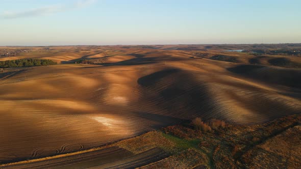 Mown Wheat Field At Sunset. Village Of Ukraine