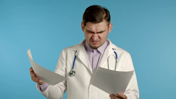 Angry Doctor Throws Away Papers. Furious Male Doc Man Throwing Crumpled Paper, Having Nervous