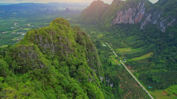 Drone are flying over the road and mountains