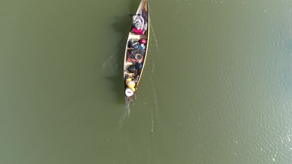 Birdseye view of a Canoe On A Jungle River