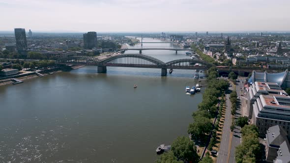 Cologne, North Rhine-Westphalia, Germany - aerial bird drone flight over the Rhein in Köln with Hohe